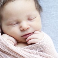 Newborn photography of a 1 week old baby girl