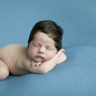 Newborn image of a sleeping baby boy