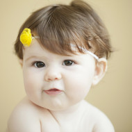 Cute toddler with flower headband
