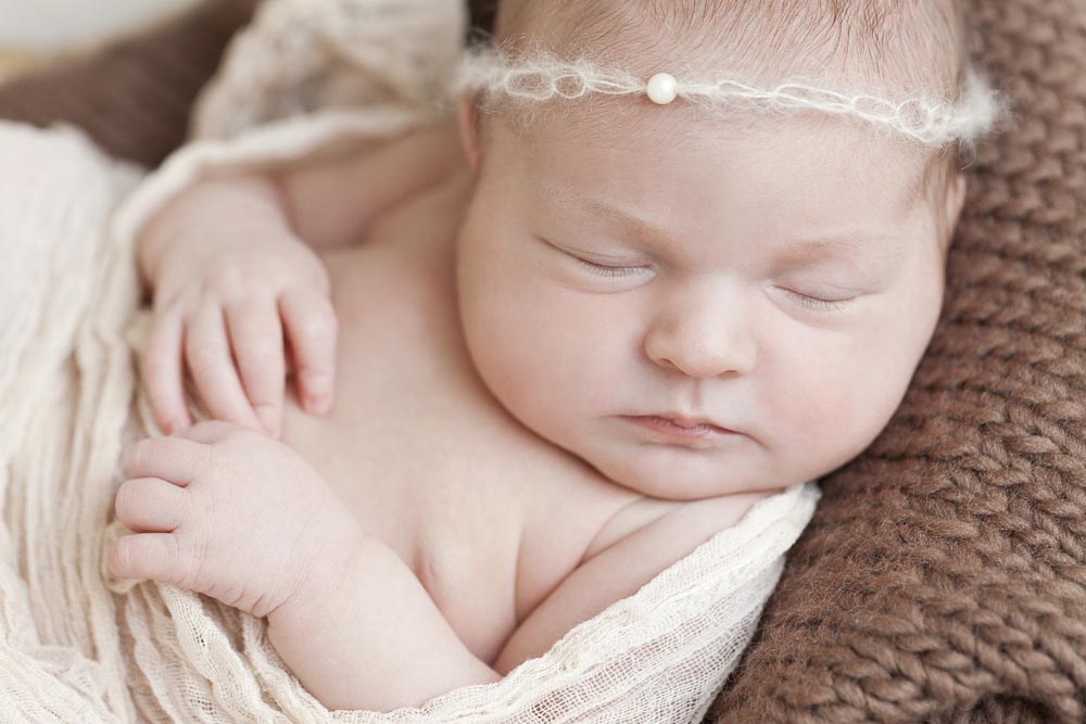 Newborn photography of a sleeping baby girl