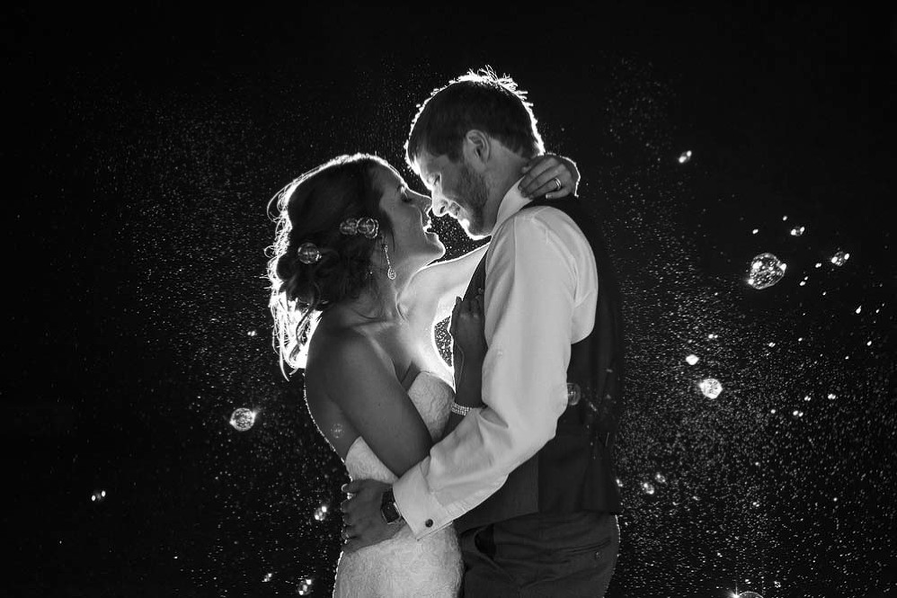 Wedding photo of a couple about to kiss