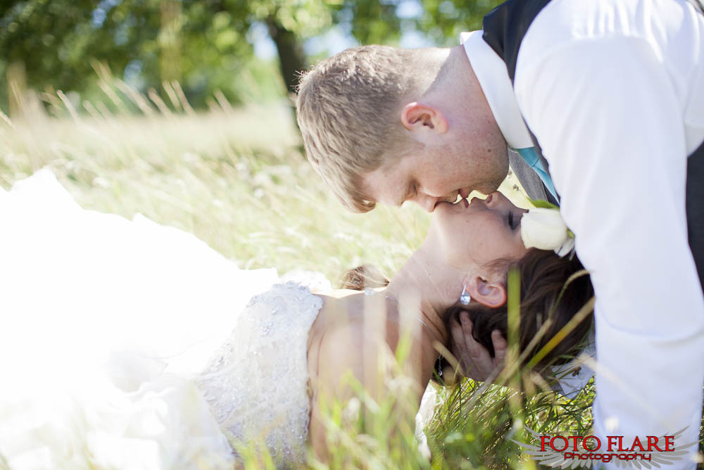 kissing in the grass