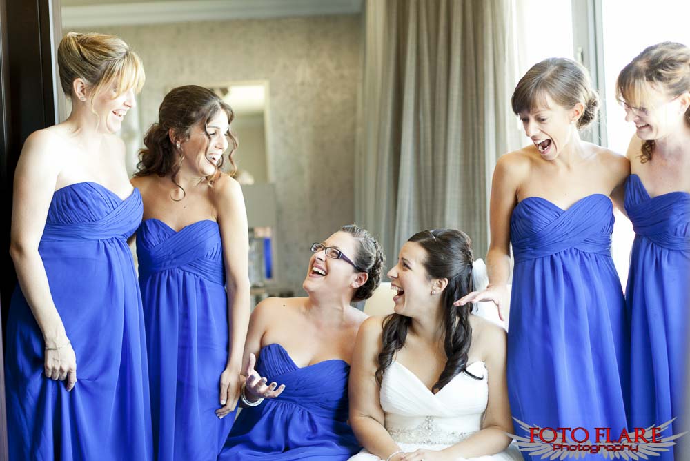 Bride having a laugh with her girls
