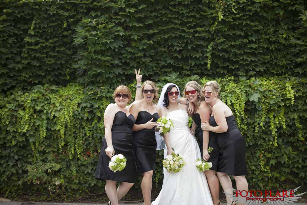 Fun wedding photo of the bride with bridesmaids