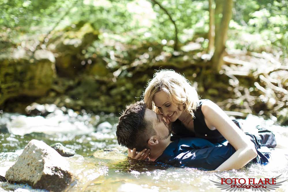 Couple laying in water