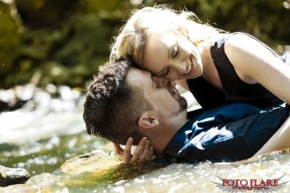 Couple laying in water