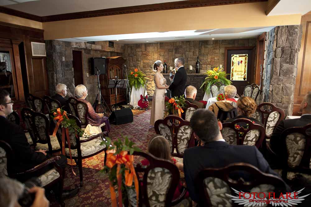 Indoor ceremony at edgewater manor