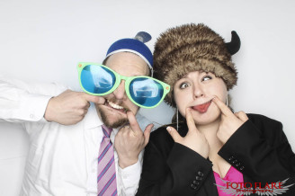 Wedding guests using our photo booth making silly faces