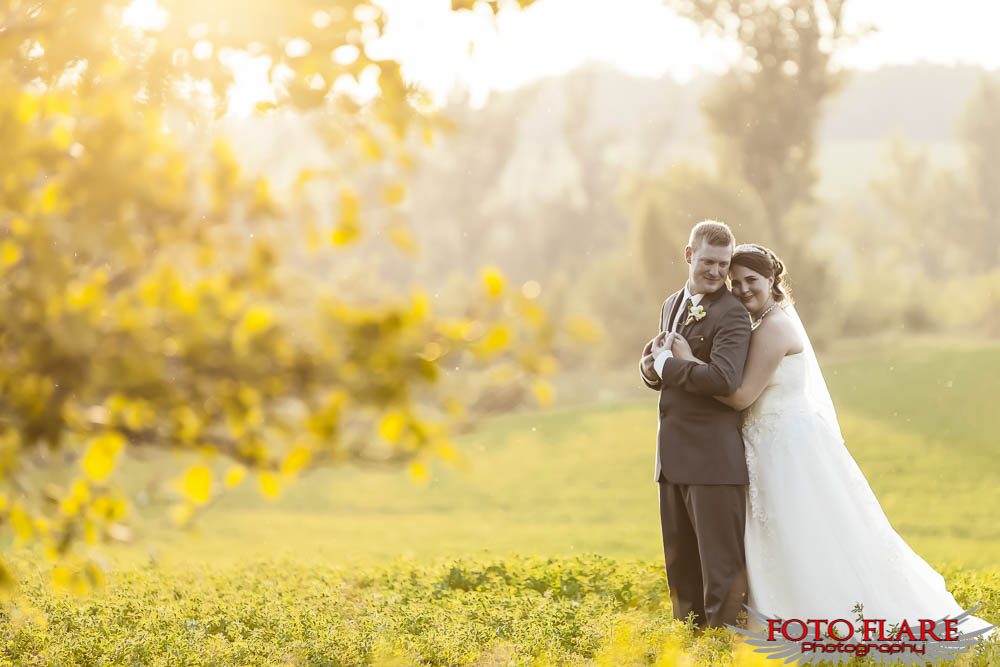 Evening portrait of the bride and groom as the sun sets at David Springer Estate