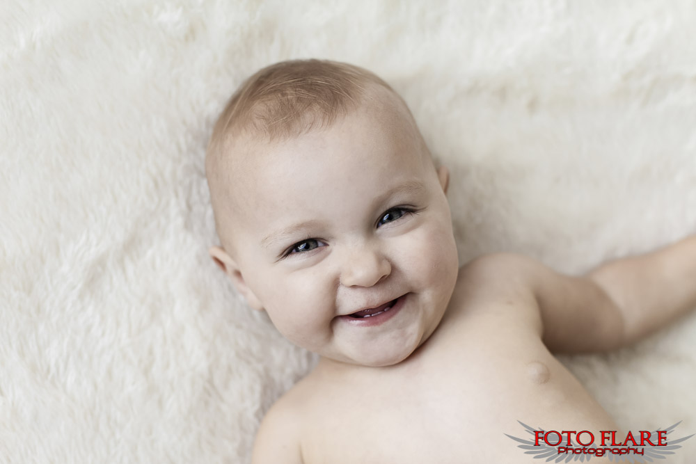 Cute baby smiles from Jake at our photography studio