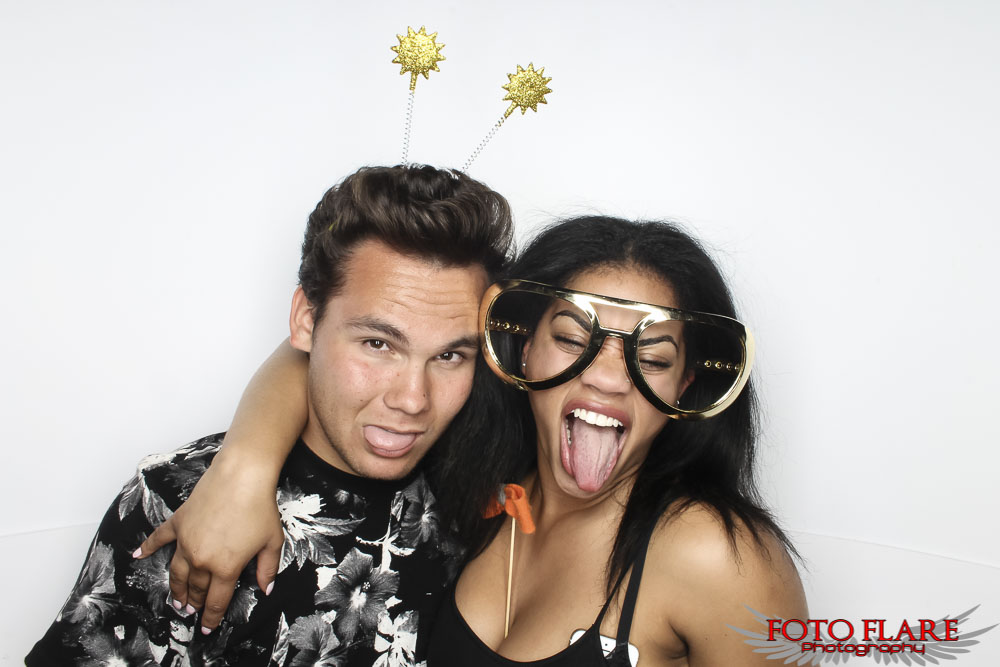 Teens in a photo booth rental in Toronto