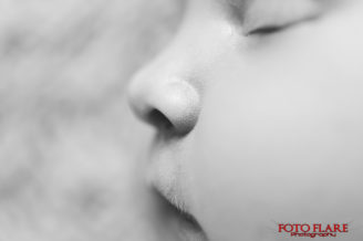 Black and white photo of a baby nose and lips