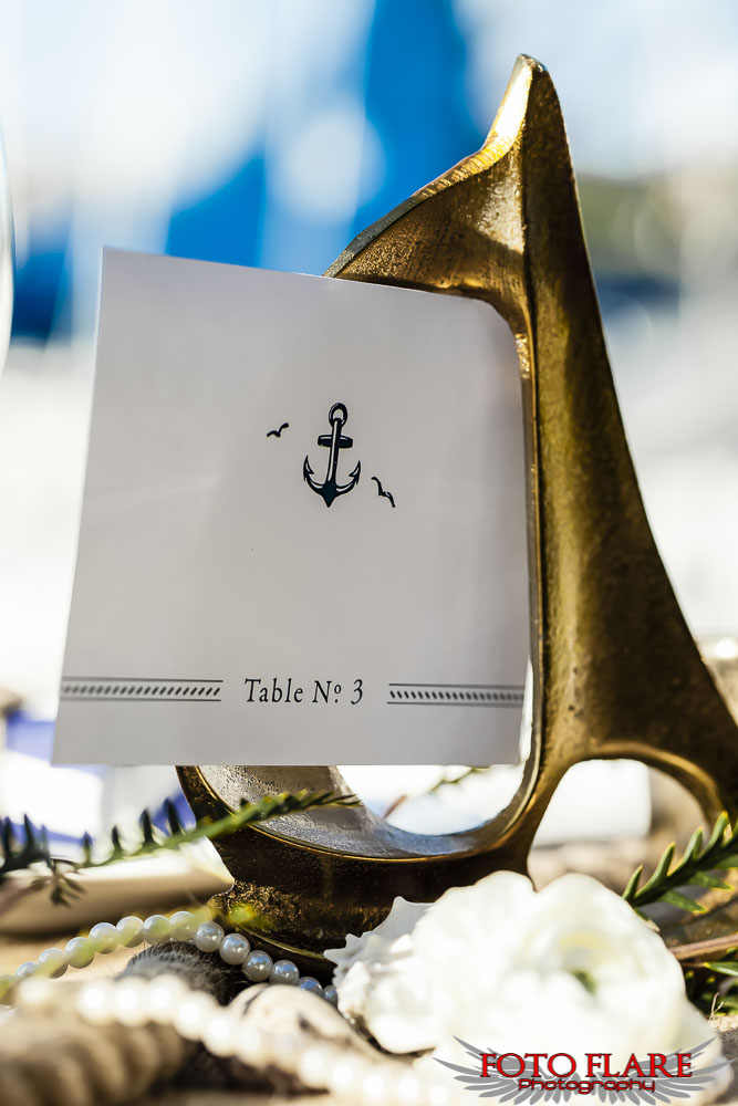 Gold sail boat with table number