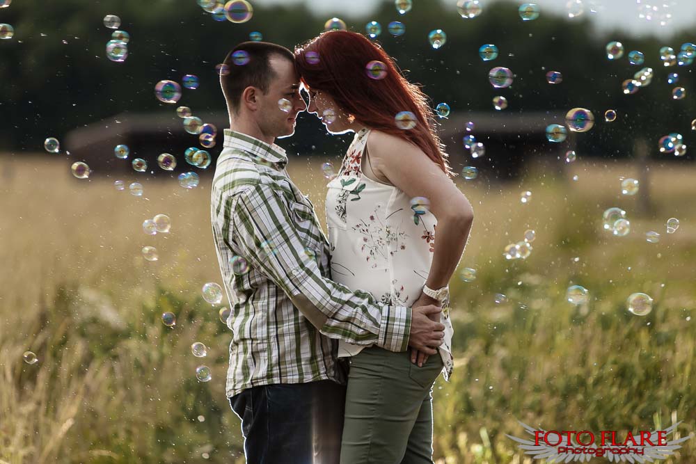 Engagement photo with bubbles