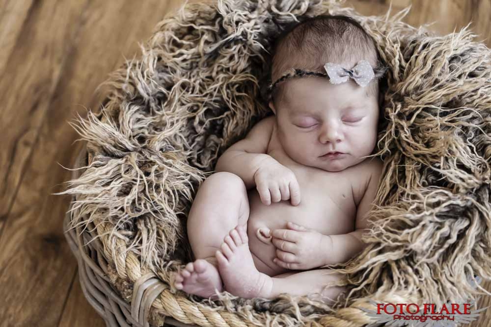 Baby girl in a basket