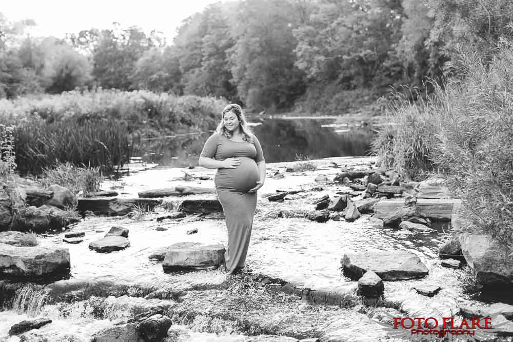 Maternity image standing in water