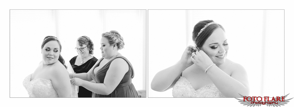 Bride putting on earrings and wedding dress