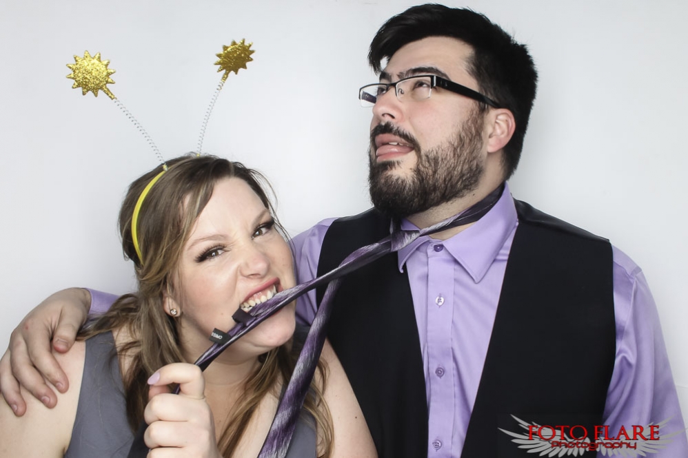 silly photo booth photos at a wedding