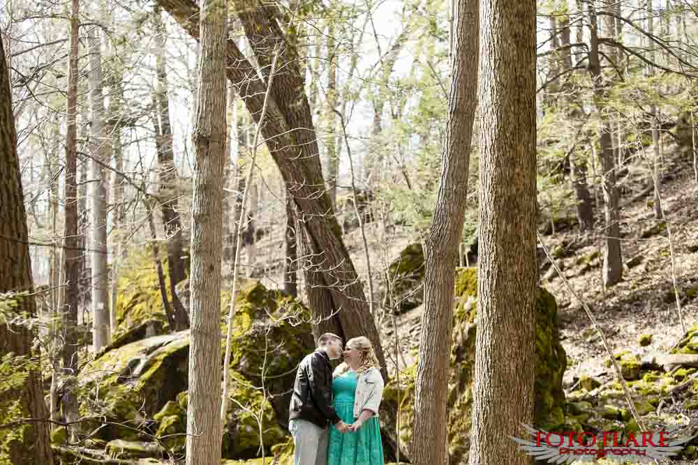 engagement photo in a forest