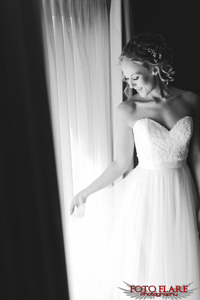 Admiring the wedding dress