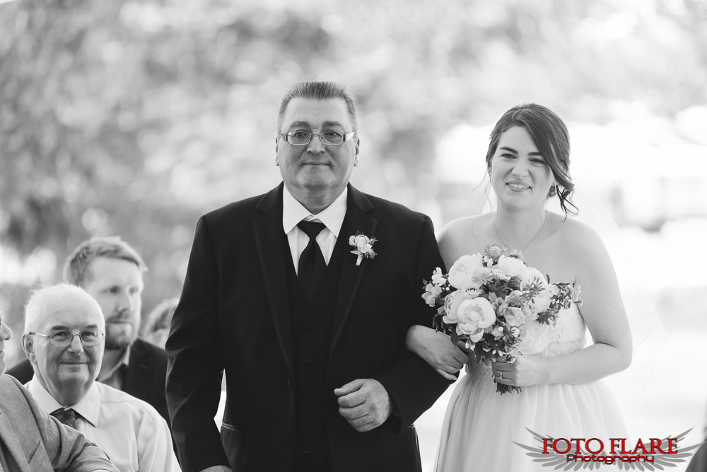 Bride with father walking down isle