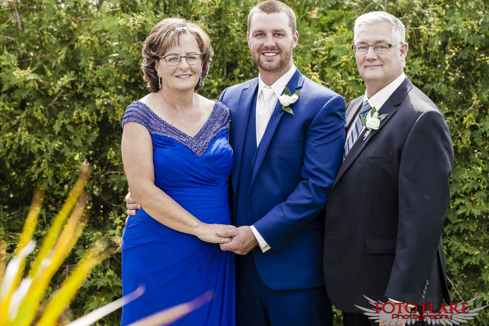 Groom with parents