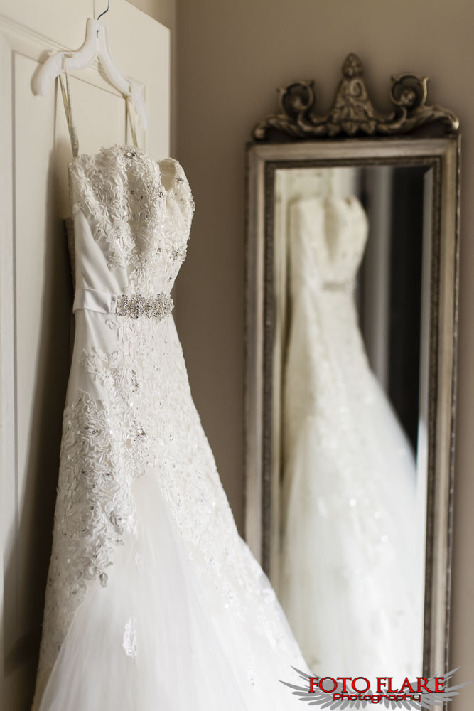 Wedding dress with reflection in mirror