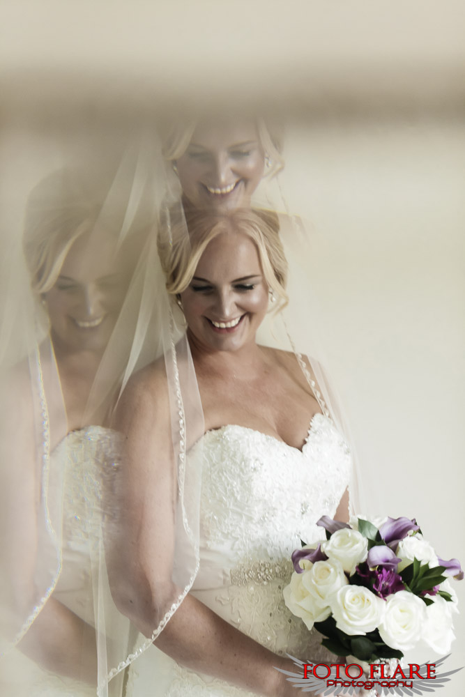 Reflections of the bride from a mirror