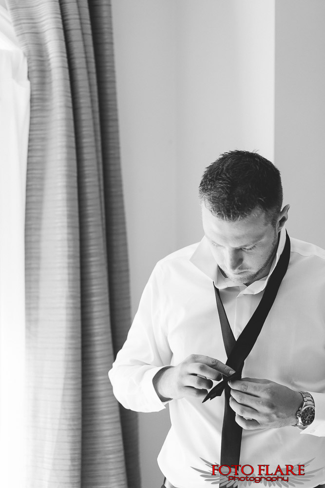 B&W photo of craig getting ready