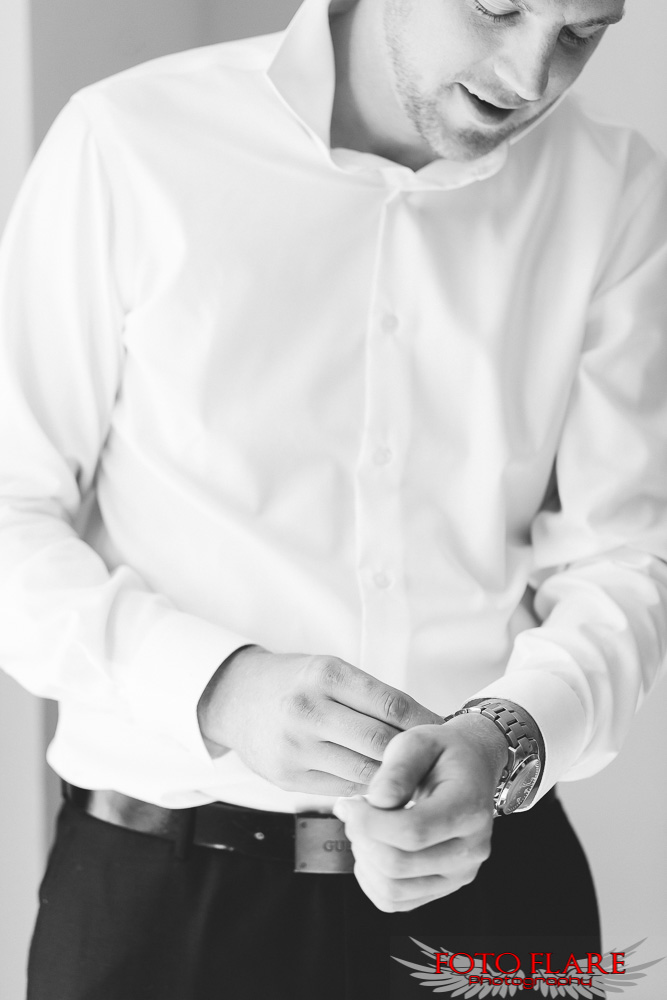 Groom putting on his watch